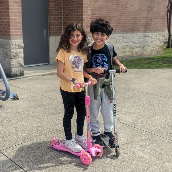 students on scooters